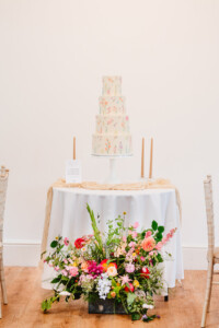 painted floral wedding cake wadhurst castle east sussex