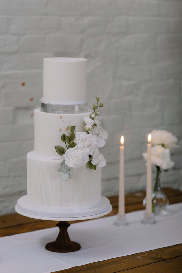 fire place wedding elegant fondant iced three tier cake