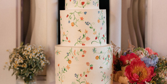 floral painted wedding cake preston court
