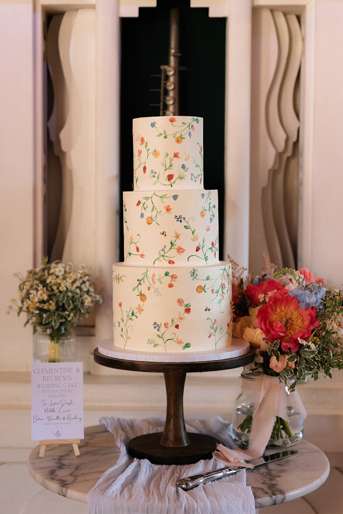 floral painted wedding cake preston court